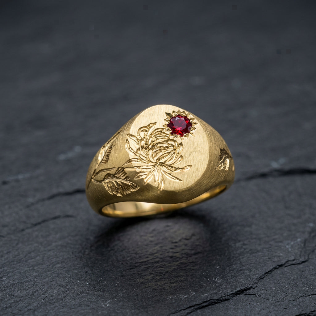 Hand engraved Chrysanthemum signet ring in 18k gold on slate by Mier Theo