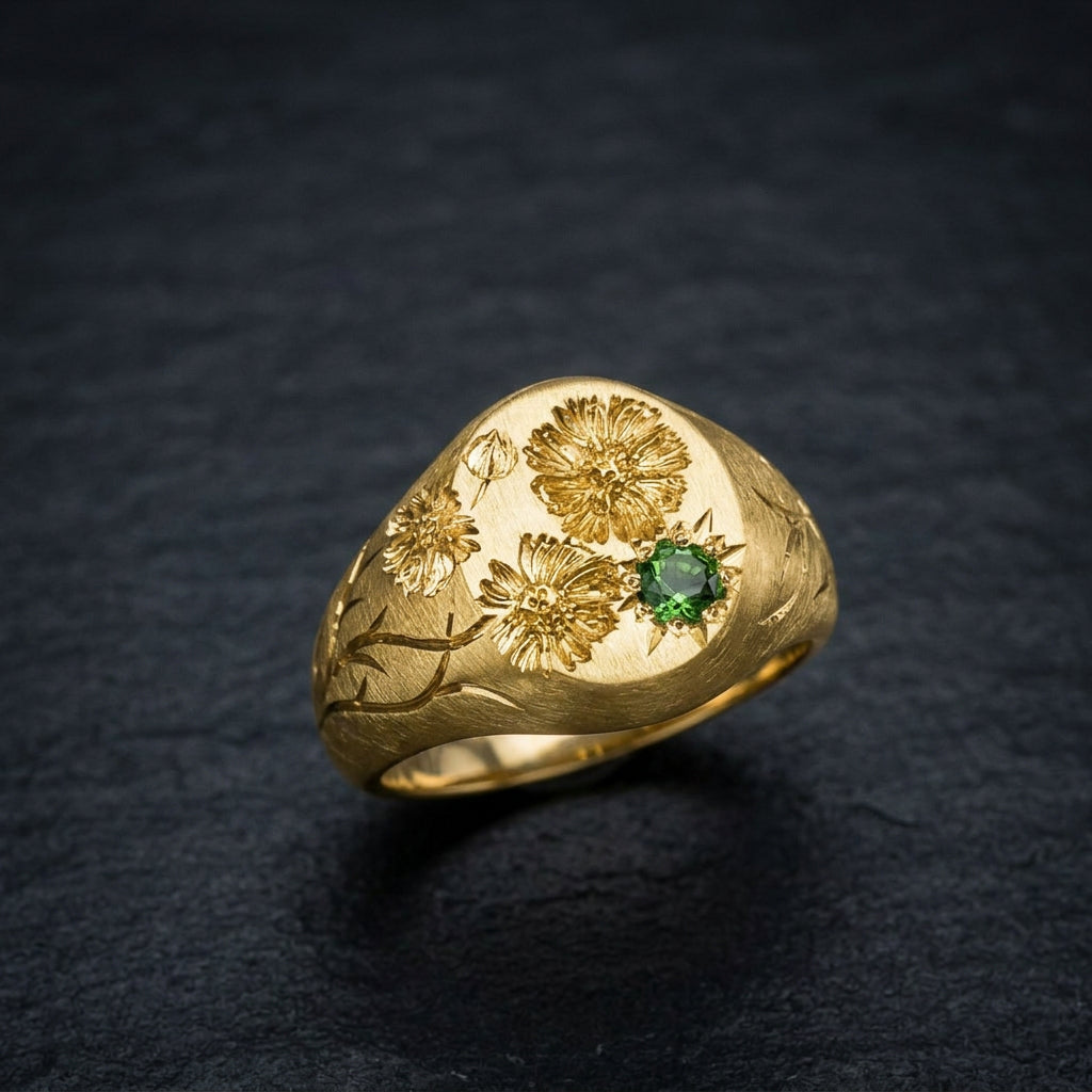 Hand engraved Cosmos signet ring in 18k gold on slate by Mier Theo