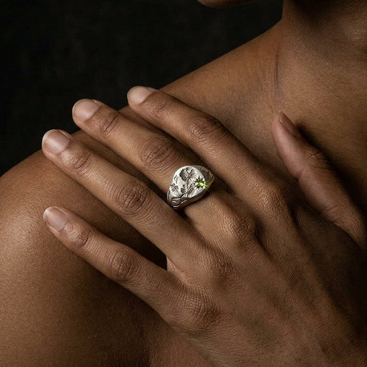 Hand engraved Cosmos signet ring in 940 Silver on hand by Mier Theo