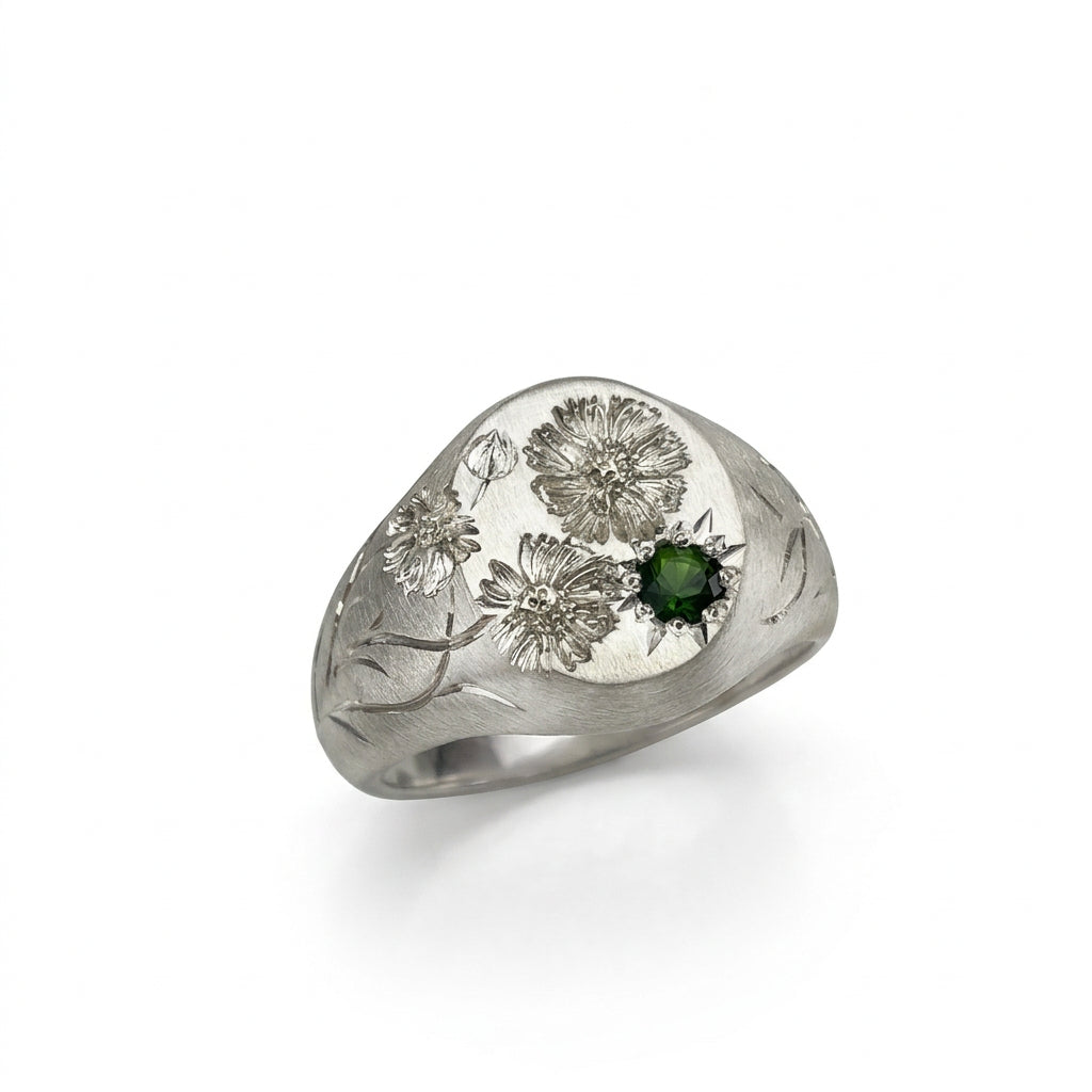 Hand engraved Cosmos signet ring in 940 Silver. Angled view. Engraved by Mier Theo