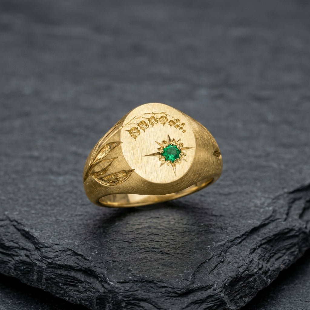 Hand engraved Lily of the Valley signet ring in 18k gold on slate by Mier Theo