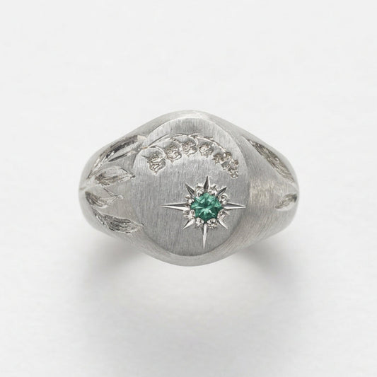 Hand engraved Lily of the Valley signet ring in 940 Silver. Top view. Engraved by Mier Theo