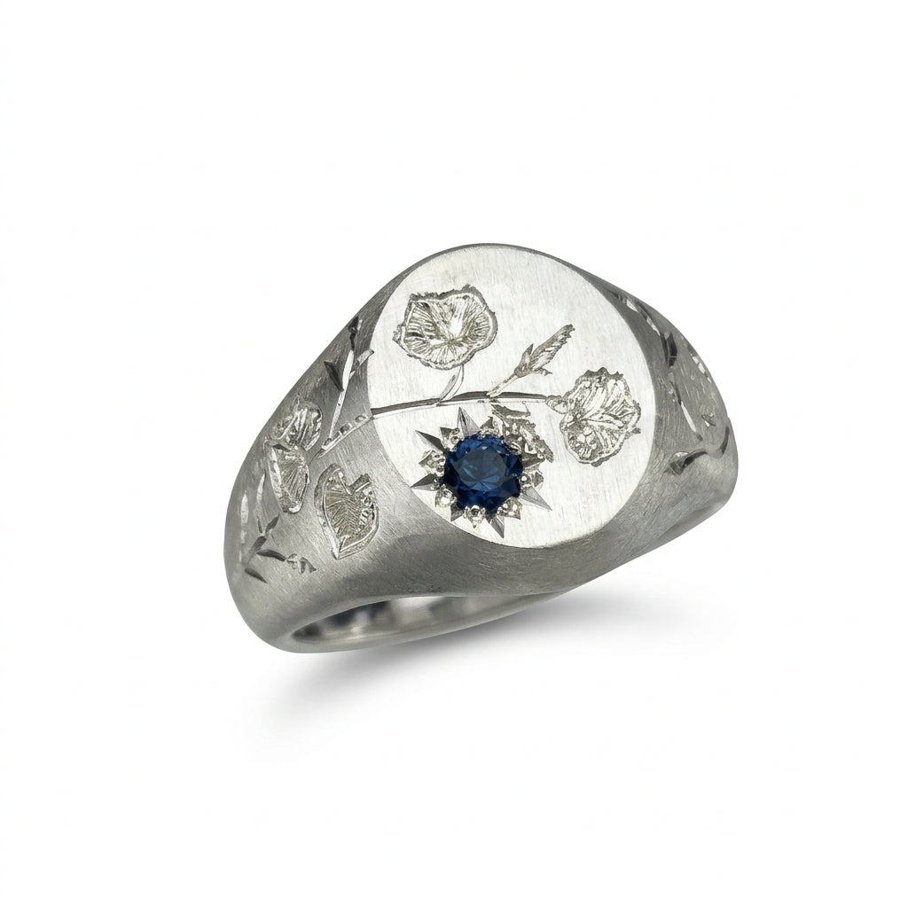 Hand engraved Morning Glory signet ring in 940 Silver. Angled view. Engraved by Mier Theo