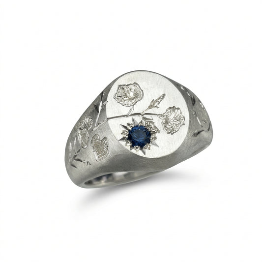 Hand engraved Morning Glory signet ring in 940 Silver. Angled view. Engraved by Mier Theo