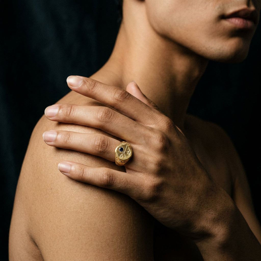 Hand engraved Morning Glory signet ring in 18k gold on hand by Mier Theo