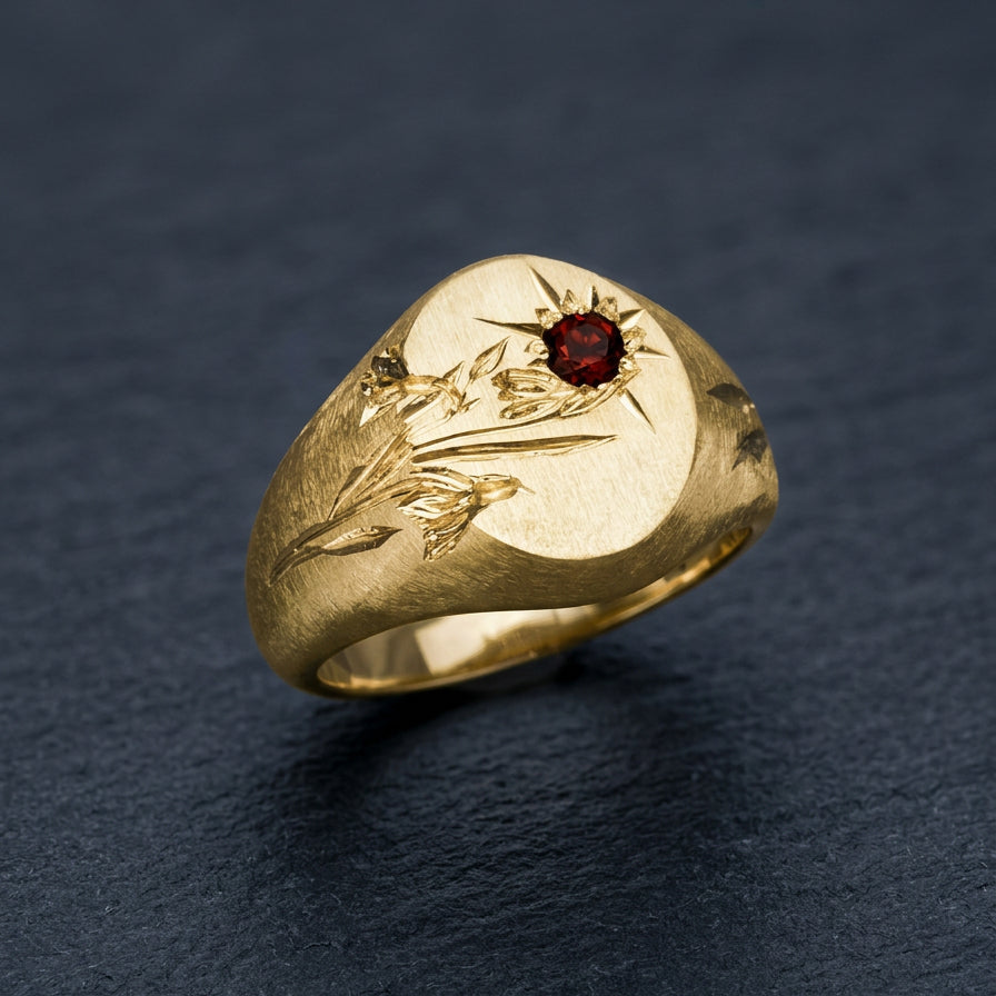 Hand engraved Snowdrop signet ring in 18k gold on slate by Mier Theo