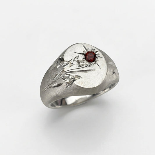 Hand engraved Snowdrop signet ring in 940 Silver. Angled view. Engraved by Mier Theo