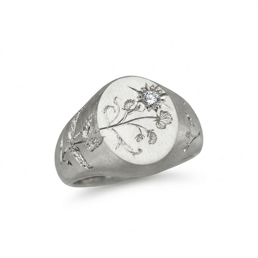 Hand engraved Sweet Pea signet ring in 940 Silver. Angled view. Engraved by Mier Theo