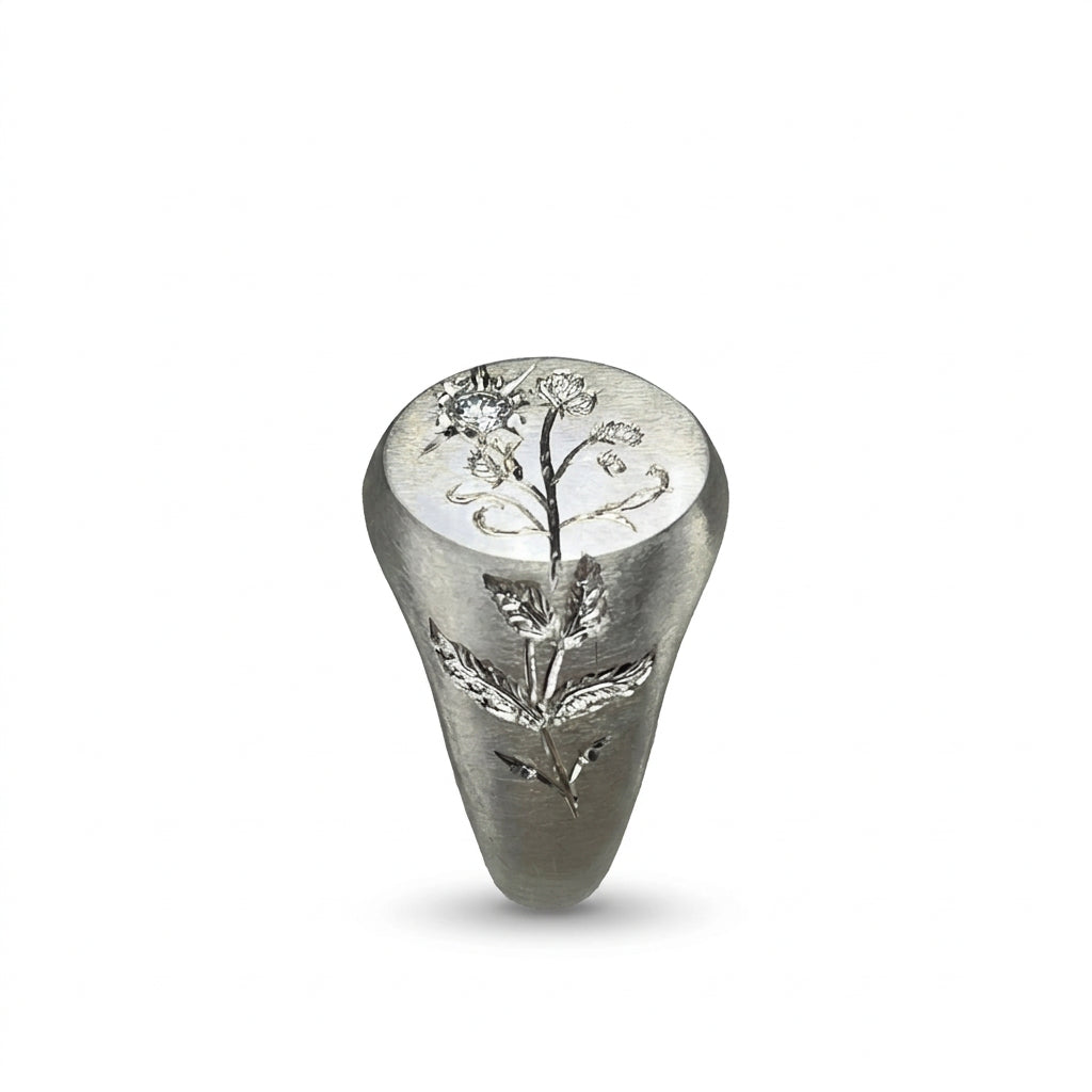 Hand engraved Sweet Pea signet ring in 940 Silver. Left view by Mier Theo