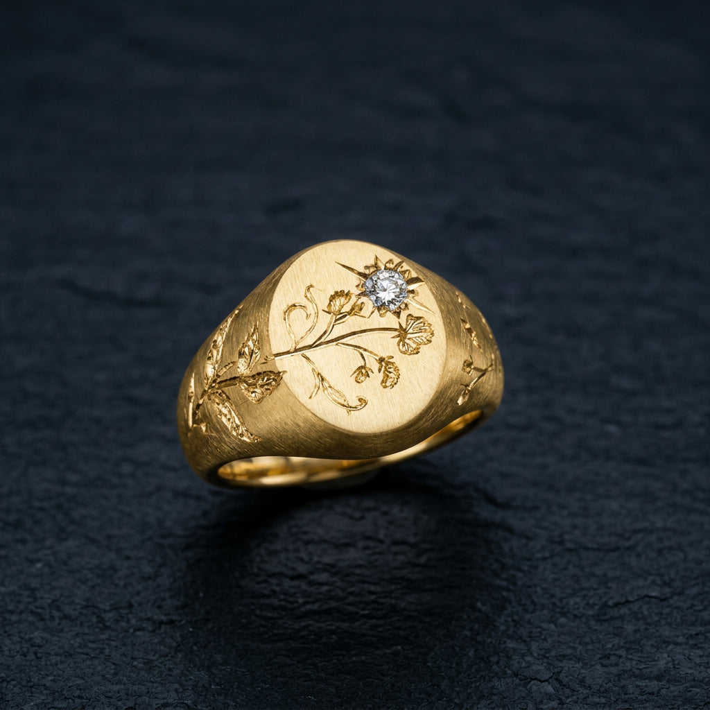 Hand engraved Sweet Pea signet ring in 18k gold on slate by Mier Theo