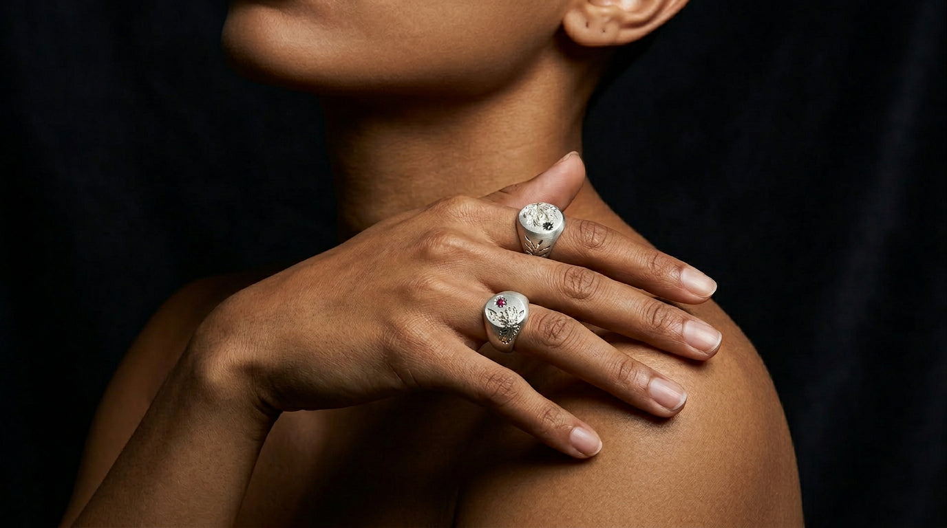 Hand engraved Honeysuckle and Water Lily signet rings in 940 Silver on hand by Mier Theo