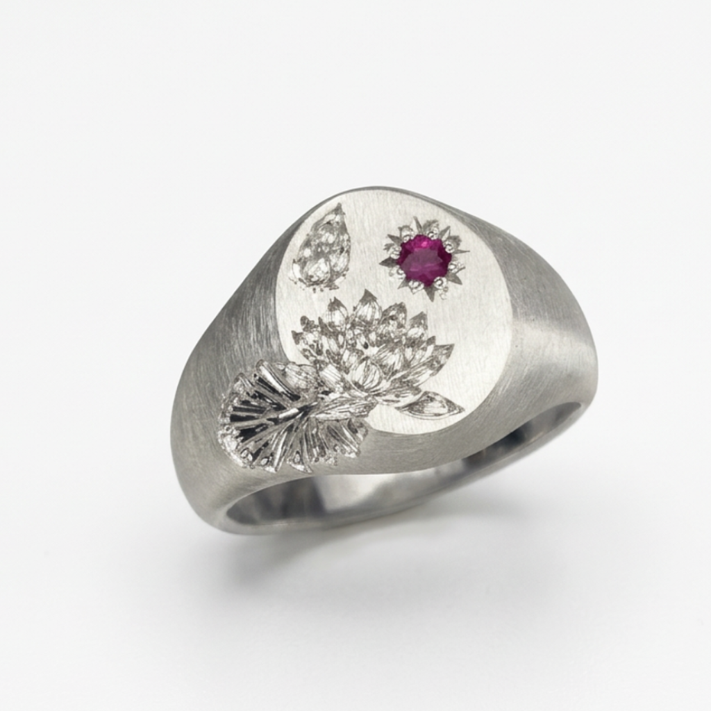 Hand engraved Water Lily signet ring in 940 Silver. Angled view. Engraved by Mier Theo