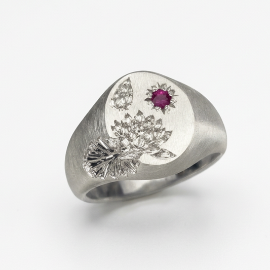 Hand engraved Water Lily signet ring in 940 Silver. Angled view. Engraved by Mier Theo